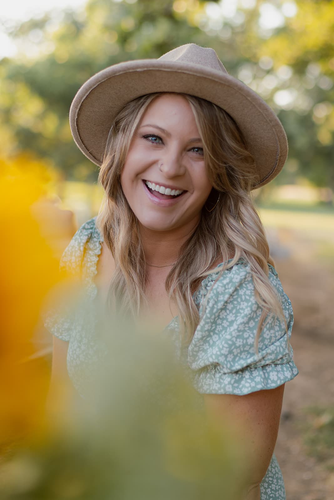Expectant mother glowing in soft natural light